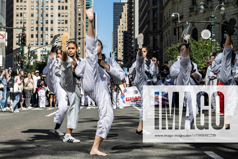Participants at the 2026 NYC Korean Parade perform karate moves for spectators. New York USA - ZUMAh214 20261003_znp_h214_025
