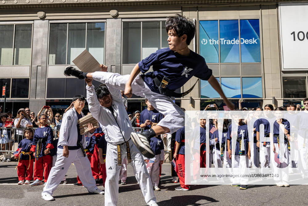 Children from a karate group participating in the 2026 NYC Korean parade perform karate moves for spectators. New York USA - ZUMAh214 20261003_znp_h214_028