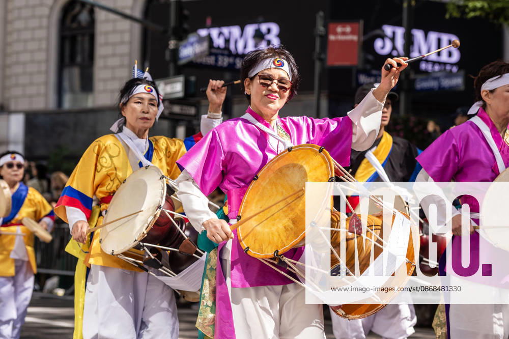 Participants at the 2026 NYC Korean Parade play drums in traditional garb. New York USA - ZUMAh214 20261003_znp_h214_039