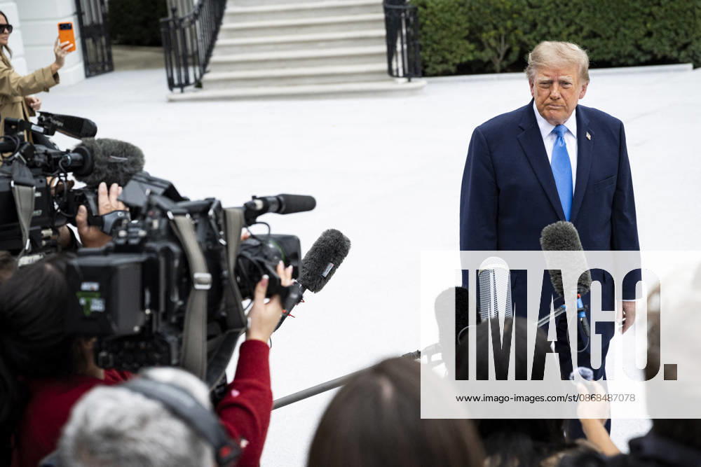 US President Donald J. Trump departs from the White House US President Donald J. Trump speaks to members of the media before boarding Marine One on the South Lawn of the White House, in Washington, DC, USA, 3 October 2026. President Trump is traveling to Ohio for a rally as he campaigns with Republican Party candidates before midterm elections. WASHINGTON DC United States