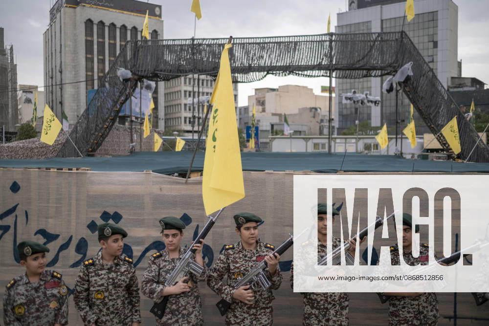 Opening Ceremony Of Second City-Square Military Training Camp Iranian schoolboys wearing military uniforms hold rifles during the opening ceremony of the second city-square military training camp for self-sacrificing forces in downtown Tehran, Iran, on October 3, 2026. The camp was established by the Basij paramilitary force, with personnel from the Islamic Republic of Iran Army responsible for training the volunteers. Tehran Tehran Iran