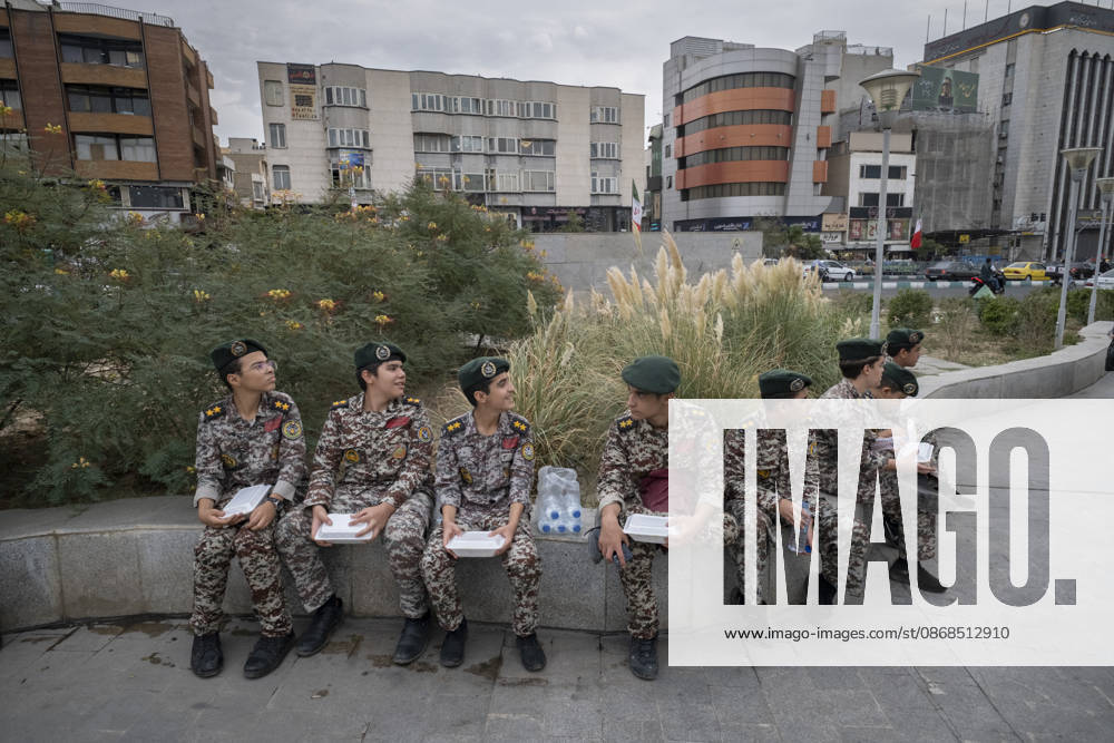 Opening Ceremony Of Second City-Square Military Training Camp Iranian schoolboys wearing Iranian Army military uniforms hold food containers as they prepare to take part in the opening ceremony of the second city-square military training camp for self-sacrificing forces in downtown Tehran, Iran, on October 3, 2026. The camp was established by the Basij paramilitary force, with personnel from the Islamic Republic of Iran Army responsible for training the volunteers. Tehran Tehran Iran