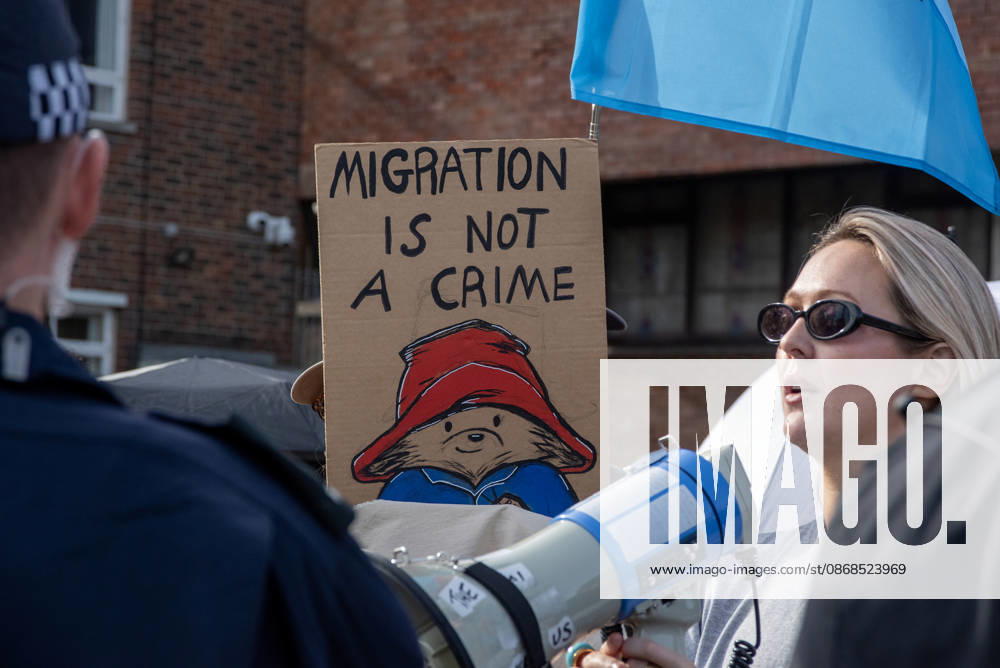 An antifascist protester holds a placard during a counter-protest in Dover. Supporters of the English Defence League (EDL) gathered in Dover, UK to march through the town all the way to the harbour. English Defence League is an extreme far-right and Islamophobic organisation. It was founded by Tommy Robinson (pseudonym of Steven Yaxley-Lennon) in 2009. Dover United Kingdom - ZUMAs197 20261003_aaa_s197_258