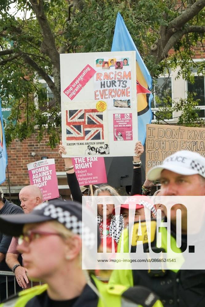 Dover, United Kingdom of Great Britain and Northern Ireland: DOVER, UNITED KINGDOM, OCTOBER 3, 2026: Anti-immigration protesters and anti-racism counter-protesters gather during rival demonstrations in Dover, Kent. Anti-immigration demonstrators carrying Union flags and St George s flags displayed banners calling for deportations and an end to small-boat crossings, while counter-protesters gathered nearby. Police maintained a significant presence between the groups and monitored the demonstrations. Dover United Kingdom of Great Britain and Northern Ireland - ZUMAq101 20261003_zna_q101_204