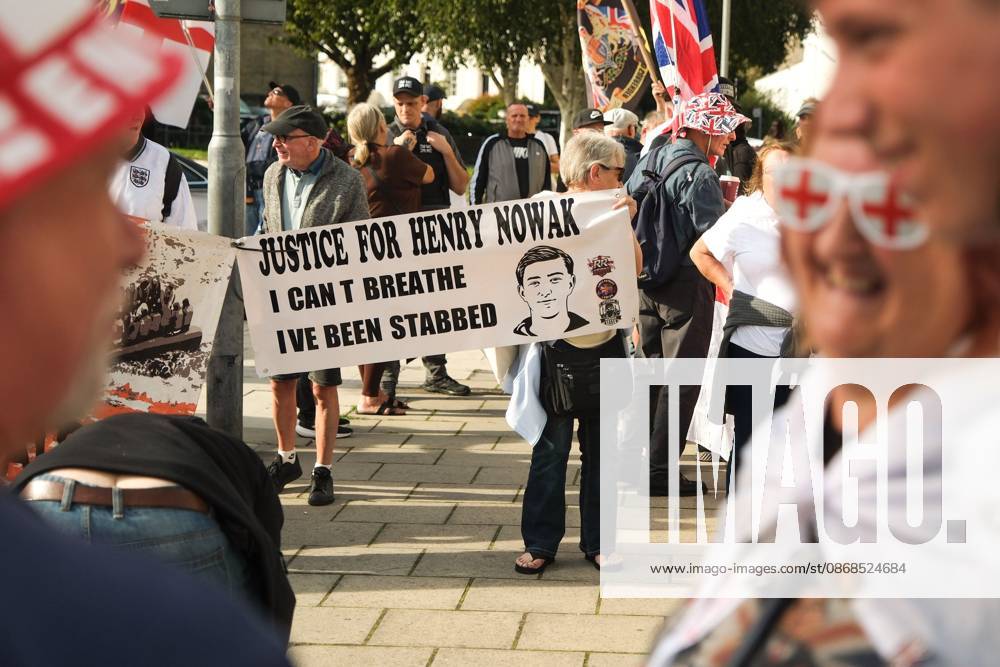 Dover, United Kingdom of Great Britain and Northern Ireland: DOVER, UNITED KINGDOM, OCTOBER 3, 2026: Anti-immigration protesters and anti-racism counter-protesters gather during rival demonstrations in Dover, Kent. Anti-immigration demonstrators carrying Union flags and St George s flags displayed banners calling for deportations and an end to small-boat crossings, while counter-protesters gathered nearby. Police maintained a significant presence between the groups and monitored the demonstrations. Dover United Kingdom of Great Britain and Northern Ireland - ZUMAq101 20261003_zna_q101_208