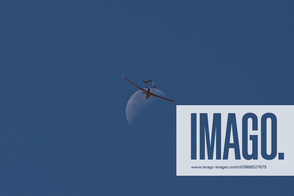 TEKNOFEST Southeast in Turkiye s Sanliurfa SANLIURFA, TURKIYE - OCTOBER 04: A Bayraktar TB2 unmanned aerial vehicle (UAV), developed by Baykar, performs a demonstration flight in the sky with the moon visible in the background during TEKNOFEST Southeast, world s largest aviation, space, and technology festival in Sanliurfa, Turkiye on October 4, 2026. Arman Önal Anadolu Sanliurfa Turkey. Editorial use only. Please get in touch for any other usage.