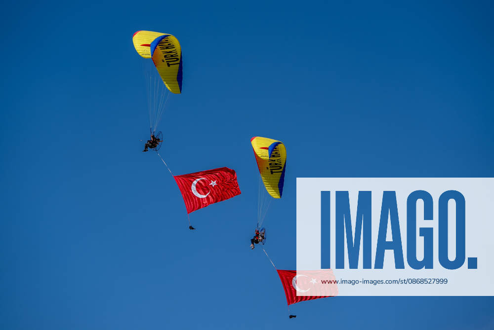 TEKNOFEST Southeast in Turkiye s Sanliurfa SANLIURFA, TURKIYE - OCTOBER 4: Turkish flags are unfurled in the sky during a paramotor demonstration at the Aviation, Space and Technology Festival (TEKNOFEST), world s largest aviation, space, and technology festival at the Sanliurfa GAP Airport for its 15th edition in Sanliurfa, Turkiye on October 4, 2026. Arman Onal Anadolu Sanliurfa Turkey. Editorial use only. Please get in touch for any other usage.