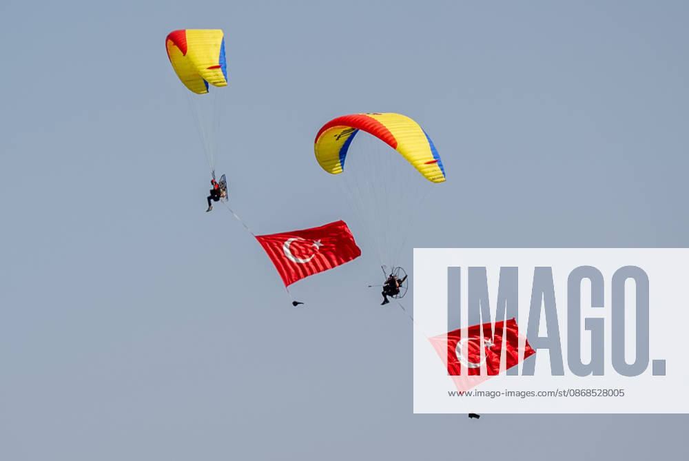 TEKNOFEST Southeast in Turkiye s Sanliurfa SANLIURFA, TURKIYE - OCTOBER 4: Turkish flags are unfurled in the sky during a paramotor demonstration at the Aviation, Space and Technology Festival (TEKNOFEST), world s largest aviation, space, and technology festival at the Sanliurfa GAP Airport for its 15th edition in Sanliurfa, Turkiye on October 4, 2026. Arman Onal Anadolu Sanliurfa Turkey. Editorial use only. Please get in touch for any other usage.
