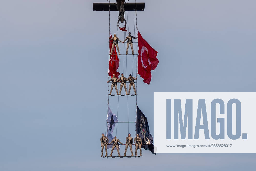 TEKNOFEST Southeast in Turkiye s Sanliurfa SANLIURFA, TURKIYE - OCTOBER 4: Soldiers aboard an S-70 helicopter wave Turkish flags during a flag flyover at the Aviation, Space and Technology Festival (TEKNOFEST), world s largest aviation, space, and technology festival at the Sanliurfa GAP Airport for its 15th edition in Sanliurfa, Turkiye on October 4, 2026. Arman Onal Anadolu Sanliurfa Turkey. Editorial use only. Please get in touch for any other usage.