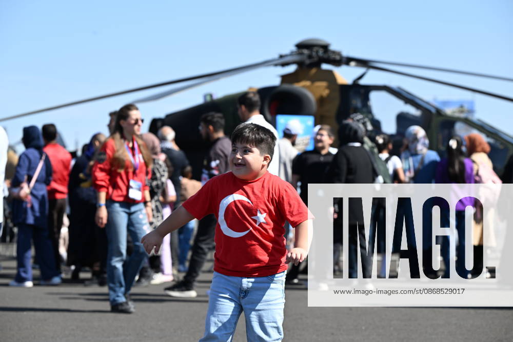 TEKNOFEST Southeast in Turkiye s Sanliurfa SANLIURFA, TURKIYE - OCTOBER 04: A boy wearing a Turkish flag T-shirt attends the Aviation, Space and Technology Festival (TEKNOFEST), the world s largest aviation, space and technology festival, at Sanliurfa GAP Airport during its 15th edition in Sanliurfa, Turkiye, on October 04, 2026. The festival is organized by the Turkish Ministry of Industry and Technology and the T3 Foundation, with Anadolu serving as its Global Communication Partner. Adsiz Gunebakan Anadolu Sanliurfa Turkey. Editorial use only. Please get in touch for any other usage.