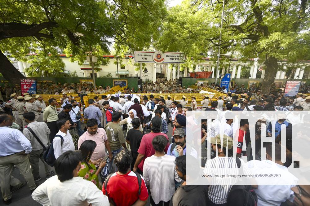 Cockroach Janta Party (CJP) chief spokesperson Saurav Das, social media journalists and other protesters gather outside Parliament Street Police Station demanding the registration of an FIR over an independent journalists allegation of sexual harassment by a senior Delhi Police officer during a protest, on October 4, 2026 in New Delhi, India. Three women journalists have accused the officers, deployed on the spot, of inappropriately touching them while they were covering the protests. On Saturday evening, several independent journalists and social media influencers staged a protest outside Parliament Street police station, seeking registration of First Information Reports (FIRs), including an assistant commi