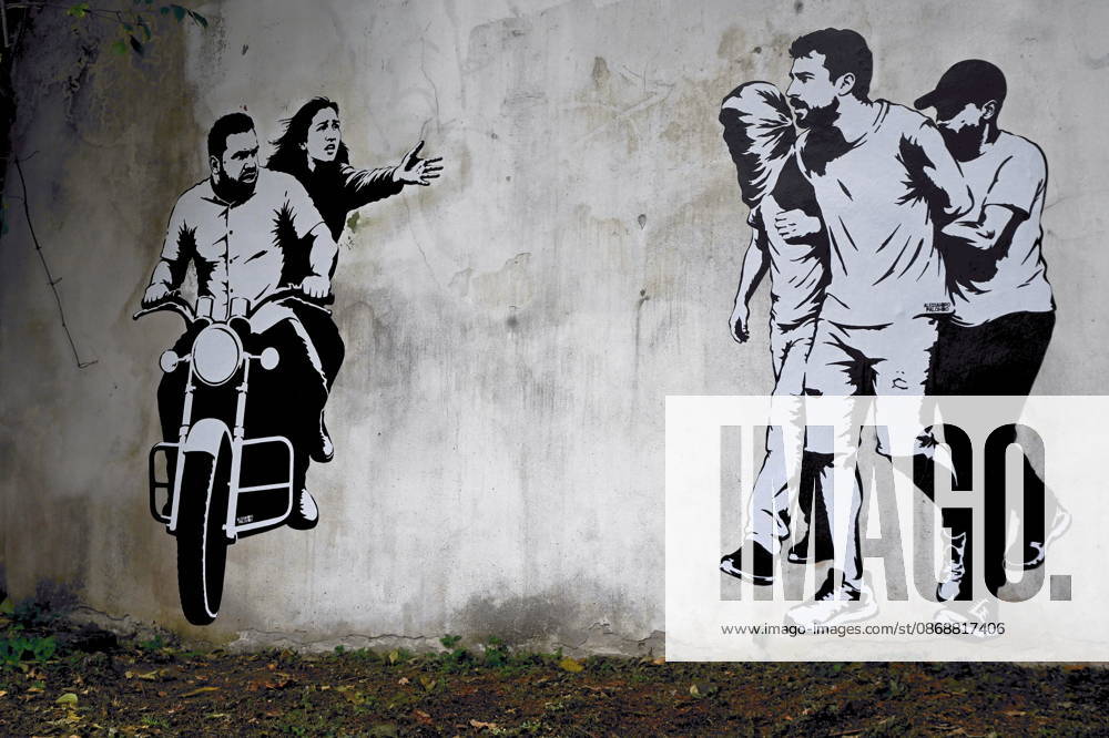 IPA89393688 - MILAN - October 7, 2026 - A mural by Alexandro Palombo, an artwork on display on October 7 at the Museum of Modern Art, located at 16 Via Palestro, dedicated to the young couple kidnapped during the attack on the Nova Music Festival