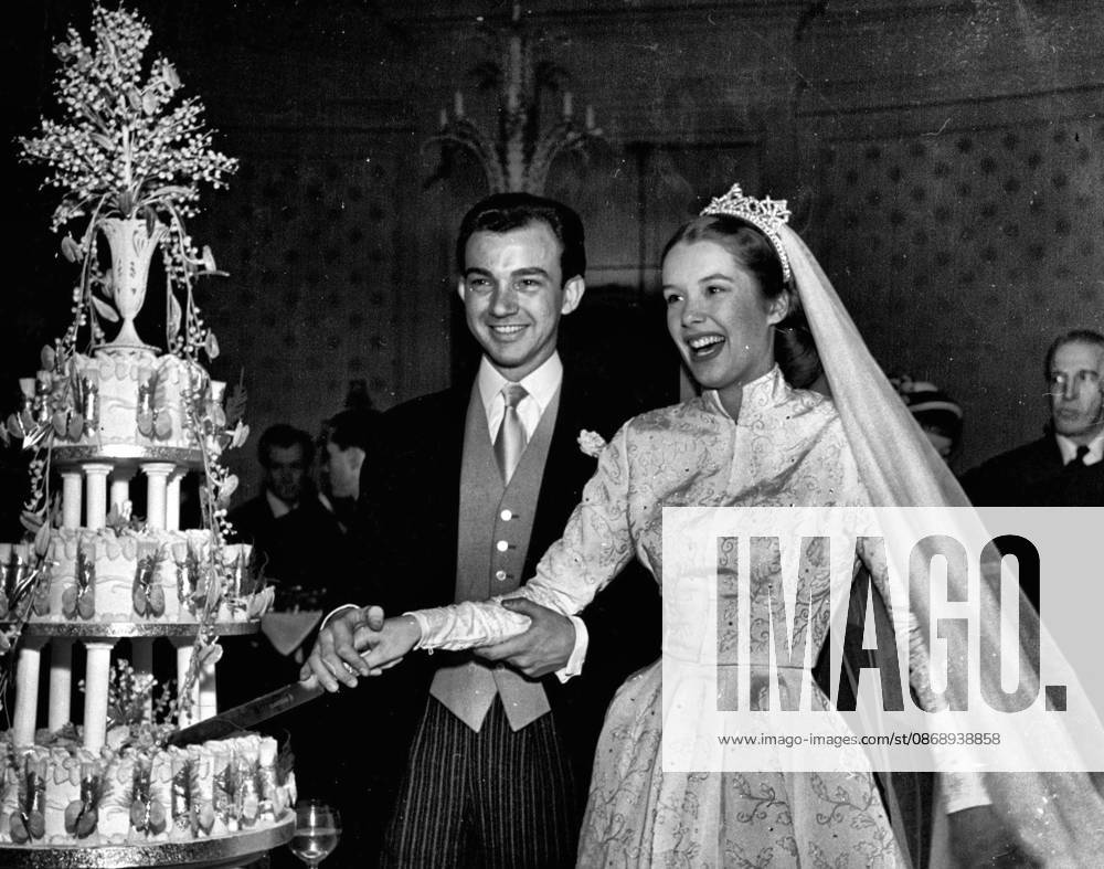 Sally Ann Howes Marries -- Sally and her husband leaving the church. At noon today 19-year-old Sally Ann Howes became Mrs. Maxwell Coker, she was wearing a sequin embreidered tight fitting gown with a military collar, and her veil was held in position by a small coronet. When Sally arrived a the King s Chapel Savoy, where she was married, she said to the Press, Hurry up, because I Can t see a thing through this Veil. March 10, 1950.