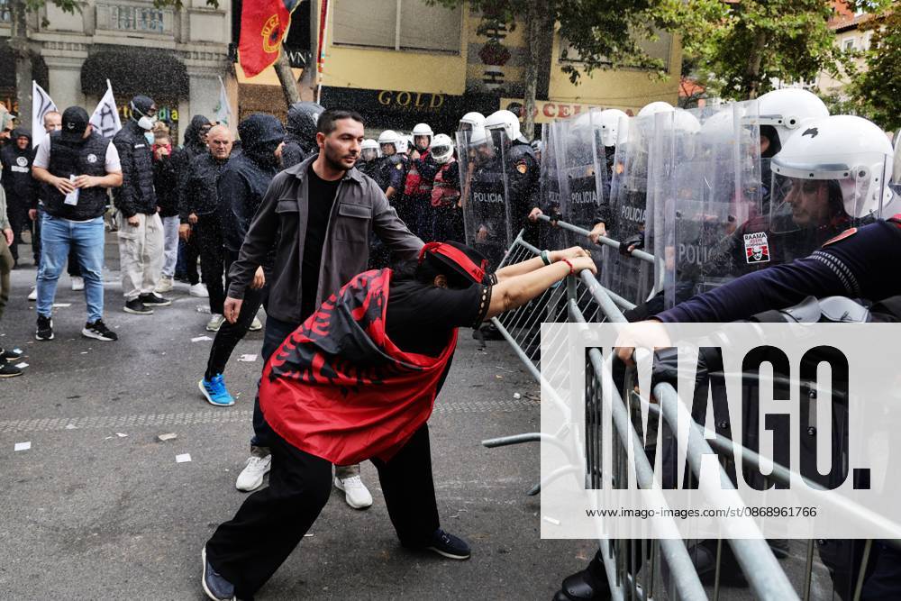 TIRANA, ALBANIA †OCTOBER 8, 2026: Citizens, local activists and supporters of the opposition gather outside the Albanian Parliament as lawmakers debate and vote on proposed changes to the countryâ€⠢s administrative-territorial division. The reform proposes reducing the number of municipalities from 61 to 46 through the merger of 15 existing municipalities, including Divjako«, PolioÂßan and Memaliaj. Residents and representatives of municipalities affected by the proposed changes joined the protest, calling for their municipalities to be preserved. Protesters displayed banners and slogans opposing the proposed mergers. Tensions escalated between protesters and police, with reports of eggs and - ZUMAq101 20261008_zna_q101_063