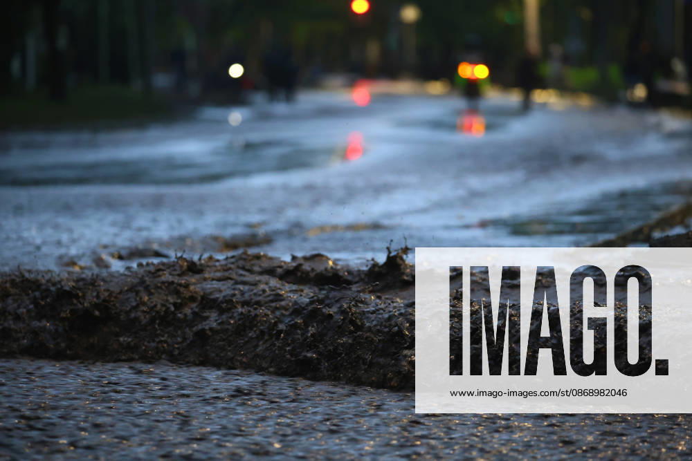 Santiago, October 8, 2026: A mudslide is affecting the area from San Carlos de Apoquindo to Los Dominicos in the Las Condes district, causing widespread damage and sweeping away vehicles and people. Dragomir Yankovic Aton, Chile, Santiago, Chile Aton 1197984