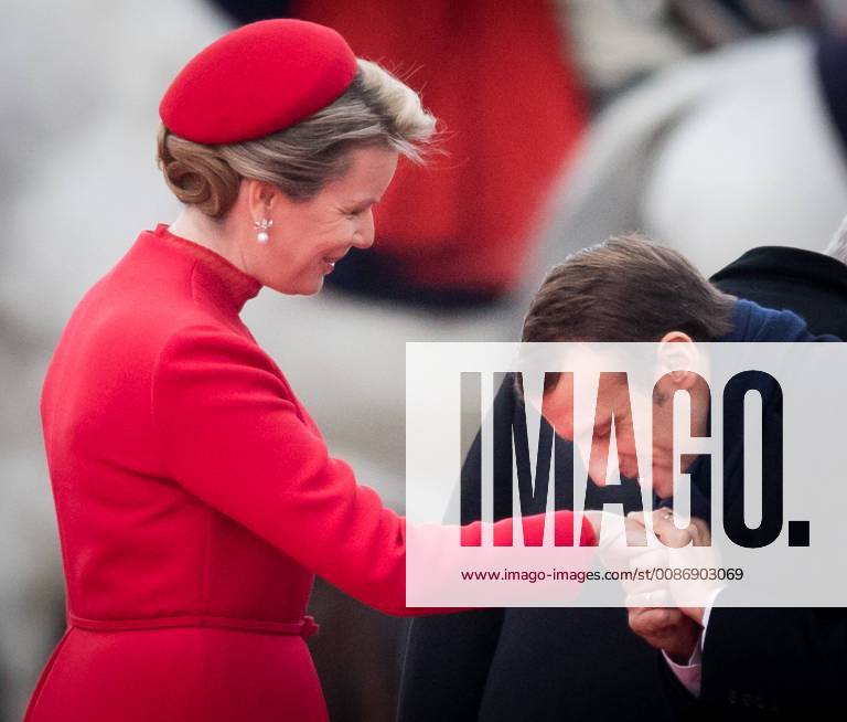 Queen Mathilde of Belgium and President of France Emmanuel Macron pictured during the official welcome ceremony at the Paleizenplein Place des Palais in Brussels on the first day of the state visit of the French Presient to Belgium, Monday 19 November 2018. BENOITxDOPPAGNE 05472756