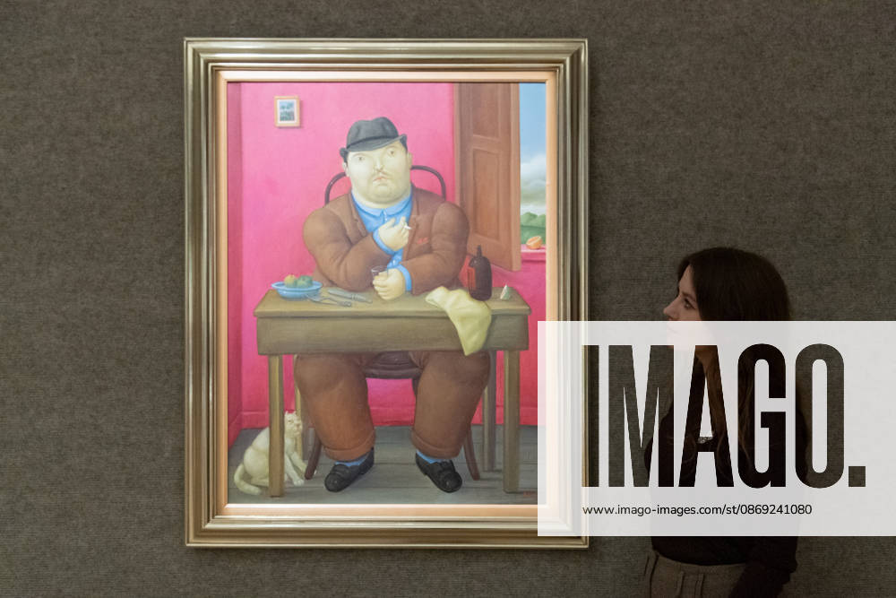 Bonhams 20th 21st Century Art Day Evening Sales Highlights Photocall - Bonhams, London, UK - 12 October, 2026 A staff member views Homme à Table by Fernando Botero (est. £250k - £350k) as part of Bonhams 20th 21st Century Art Day Evening Sales which is to go on auction from 15th - 16th October 2026 at Bonhams in London, England, UK on Monday 12 October, 2026., Credit:Justin Ng Avalon UK, England, London, Bonhams