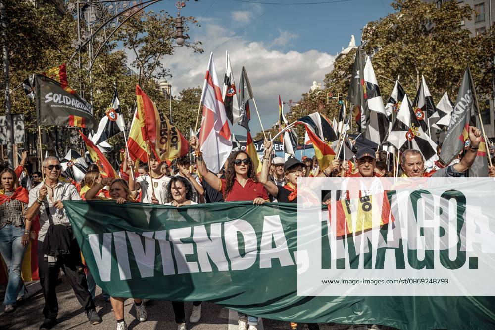 Demonstrators carry flags and banners during a rally marking Spainâ€⠢s National Day. Barcelona Spain - ZUMAo105 20261012_fap_o105_001
