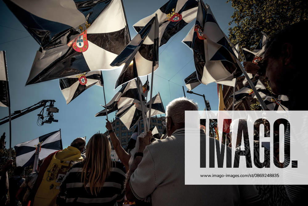 Demonstrators wave flags of Ceuta during a rally marking SpainÃ¢â‚¬â ¢s National Day. Barcelona Spain - ZUMAo105 20261012_fap_o105_012