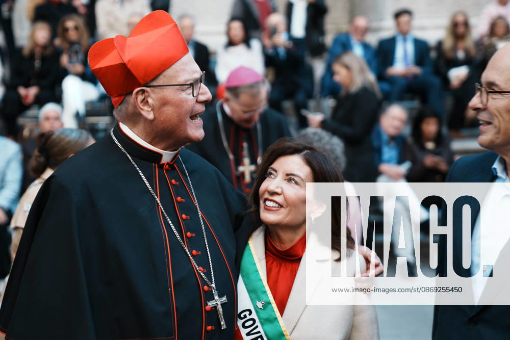 Cardinal TIMOTHY DOLAN and NY State Governor KATHY HOCHUL and her husband BILL HOCHUL at the 82nd Annual Columbus Day Parade up Fifth Avenue on October 12, 2026 in New York. This year s celebration commemorates 250 Years of Italian Contribution to America, honoring the generations who helped shape the nation and the vibrant community that continues to carry their legacy forward. New York USA - ZUMAb148 20261012_zap_b148_020