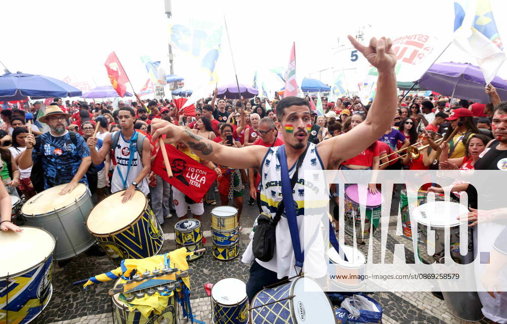 Thousands of supporters gather in Copacabana, Rio de Janeiro, Brazil, on October 12, 2026, for a pro-democracy demonstration organized by the CENA Nacional movement, the National Union of Students (UNE) and Universibloco. Held on BrazilÃ¢â‚¬â ¢s Our Lady of Aparecida national holiday, the rally calls for the defense of constitutional rights and public policies supporting healthcare, education and social assistance. Carnival street bands, known as blocos, and percussion groups brought music and a festive atmosphere to the waterfront mobilization, blending political activism with RioÃ¢â‚¬â ¢s popular street culture. The demonstration takes place ahead of BrazilÃ¢â‚¬â ¢s October 25 pres - ZUMAport 20261012_znp_k251_002