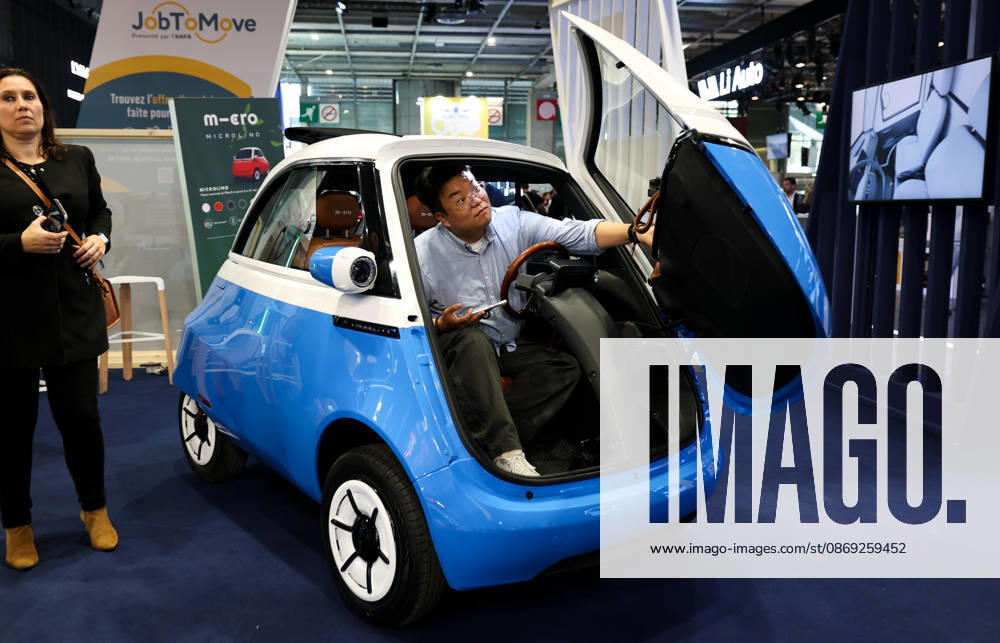 (261012) -- PARIS, Oct. 12, 2026 -- A visitor tries out a vehicle on display at the Paris Motor Show in Paris, France, Oct. 12, 2026. The 2026 Paris Motor Show kicked off here on Monday. ) FRANCE-PARIS-MOTOR SHOW 2026 WuxHuiwo