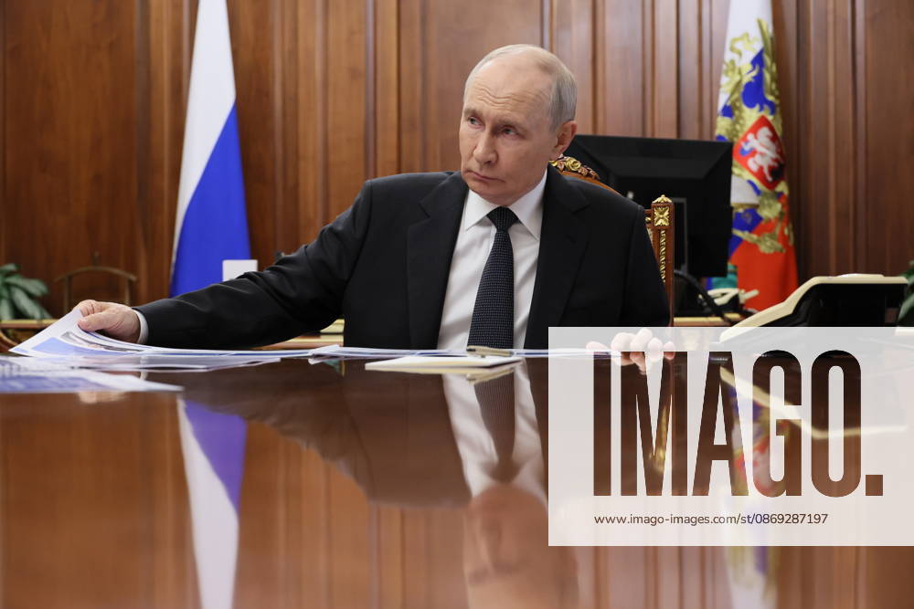 RUSSIA, MOSCOW - OCTOBER 13, 2026: Russian President Vladimir Putin is seen during a meeting with Russian Transport Minister Andrei Nikitin. Mikhail Metzel Russian Presidential Press and Information Office TASS 99231524