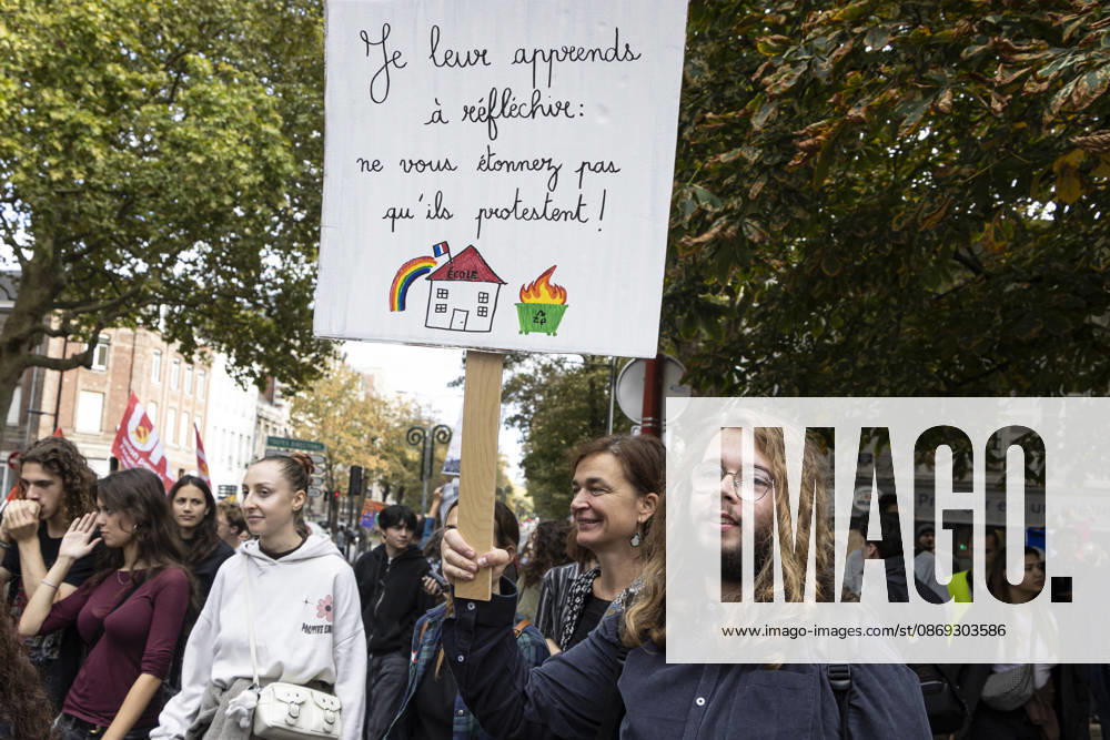 High School Students Protest Education Budget Cuts In Lille - France Protesters seen holding placards as they march through the streets during the demonstration. Thousands of high school students and protesters are marching through the streets to protest against budget cuts affecting high schools and the entire national education system in Lille on 13 October 2026. Photo by Sebastien Courdji ABACAPRESS Lille Hauts-de-France France