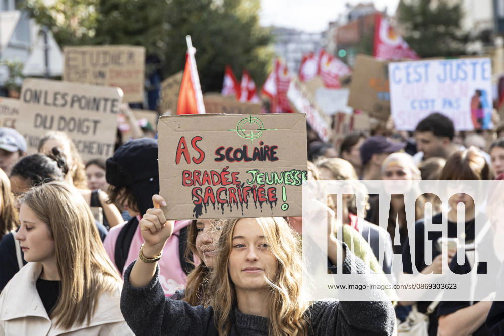 High School Students Protest Education Budget Cuts In Lille - France Protesters seen holding placards as they march through the streets during the demonstration. Thousands of high school students and protesters are marching through the streets to protest against budget cuts affecting high schools and the entire national education system in Lille on 13 October 2026. Photo by Sebastien Courdji ABACAPRESS Lille Hauts-de-France France