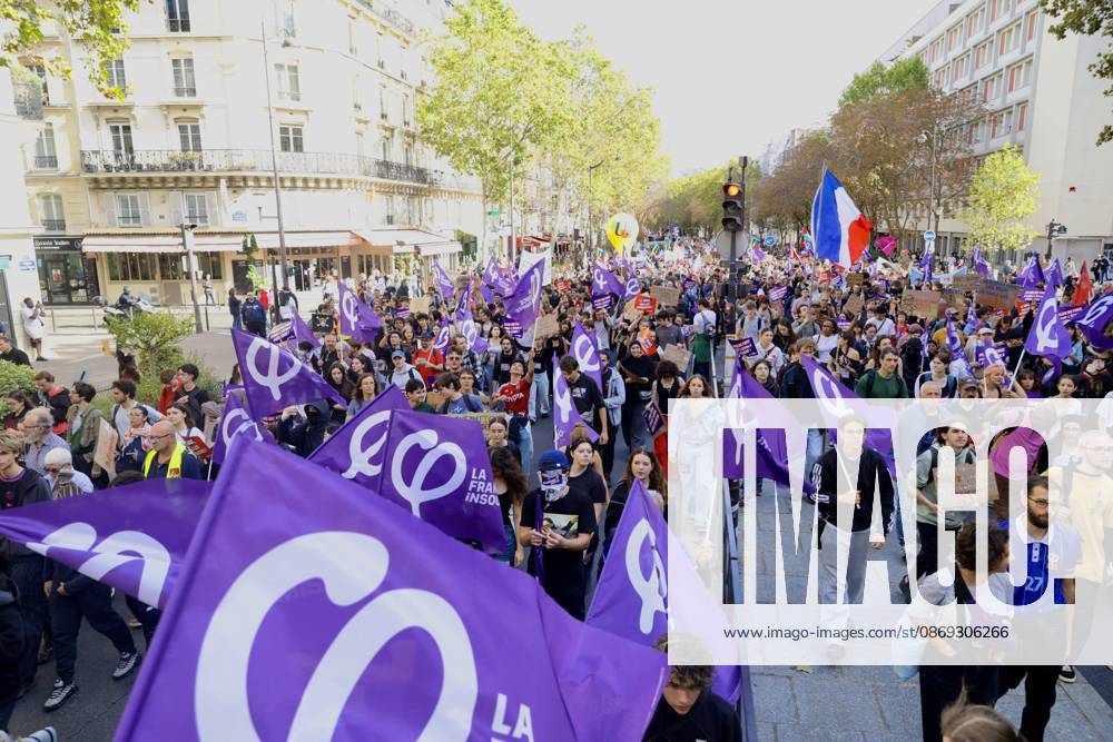 Demonstrators rally at Place d Italie in Paris amid nationwide protests across France against government policies PARIS, FRANCE - OCTOBER 13: Protesters wave union flags and hold banners during a mass demonstration at Place d Italie in Paris, France, on October 13, 2026. Trade unions, civil society organizations, and citizens took to the streets in cities across France to voice strong opposition to the government s economic reforms, proposed austerity measures, and labor policies. Ibrahim Ezzat Anadolu Ile-de-France France. Editorial use only. Please get in touch for any other usage.