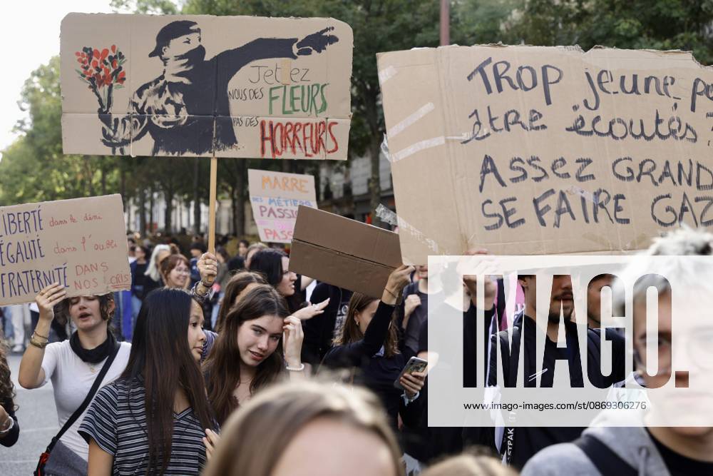 Demonstrators rally at Place d Italie in Paris amid nationwide protests across France against government policies PARIS, FRANCE - OCTOBER 13: Protesters wave union flags and hold banners during a mass demonstration at Place d Italie in Paris, France, on October 13, 2026. Trade unions, civil society organizations, and citizens took to the streets in cities across France to voice strong opposition to the government s economic reforms, proposed austerity measures, and labor policies. Ibrahim Ezzat Anadolu Ile-de-France France. Editorial use only. Please get in touch for any other usage.