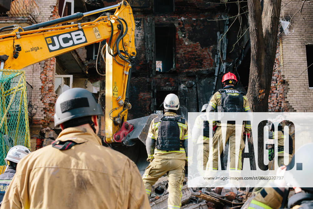 Consequences Of The Attack On Kharkiv Rescuers wait for heavy machinery to recover the body of a woman killed in a Russian airstrike in Kharkiv, Ukraine, on October 13, 2026. Kharkiv Ukraine