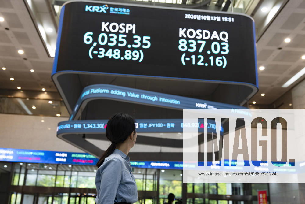 South Korea Stocks Plunge As KOSPI Drops Sharply At KRX In Seoul A Korea Exchange (KRX) employee looks up at the electronic board displaying the closing KOSPI index at 6,035.35 (-348.89) and KOSDAQ index at 837.03 (-12.16) in Yeouido, Seoul, South Korea, on October 13, 2026. Seoul Seoul South Korea