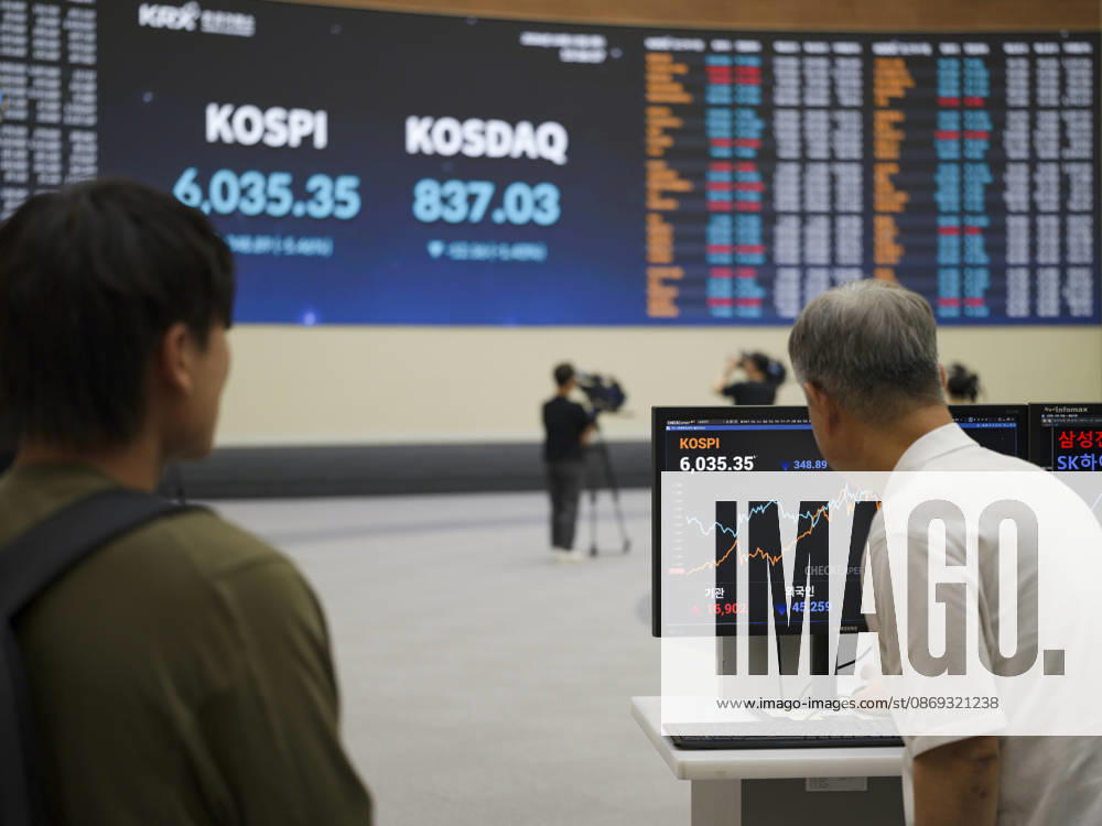 South Korea Stocks Plunge As KOSPI Drops Sharply At KRX In Seoul Visitors and market analysts monitor stock charts in front of the main display board at the Korea Exchange (KRX) in Yeouido, Seoul, South Korea, on October 13, 2026. The KOSPI closed at 6,035.35, down 348.89 points. Seoul Seoul South Korea