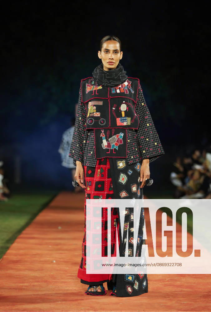 Lakme Fashion Week x FDCI Kicks Off in New Delhi New Delhi, Oct 13 (ANI): A model walks the ramp on the opening day of the Lakme Fashion Week x FDCI, at the France Embassy, in New Delhi on Tuesday. New Delhi Delhi India