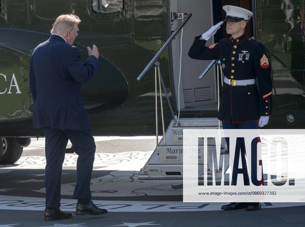 United States President Donald J Trump salutes the Marine Guard as he boards Marine One to depart for a campaign trip to Alaska, Nevada, Arizona and Montana from the South Lawn of the White House in Washington, DC, USA, on Tuesday, October 13, 2026 Washington USA - ZUMAs152 20261013_faa_s152_039