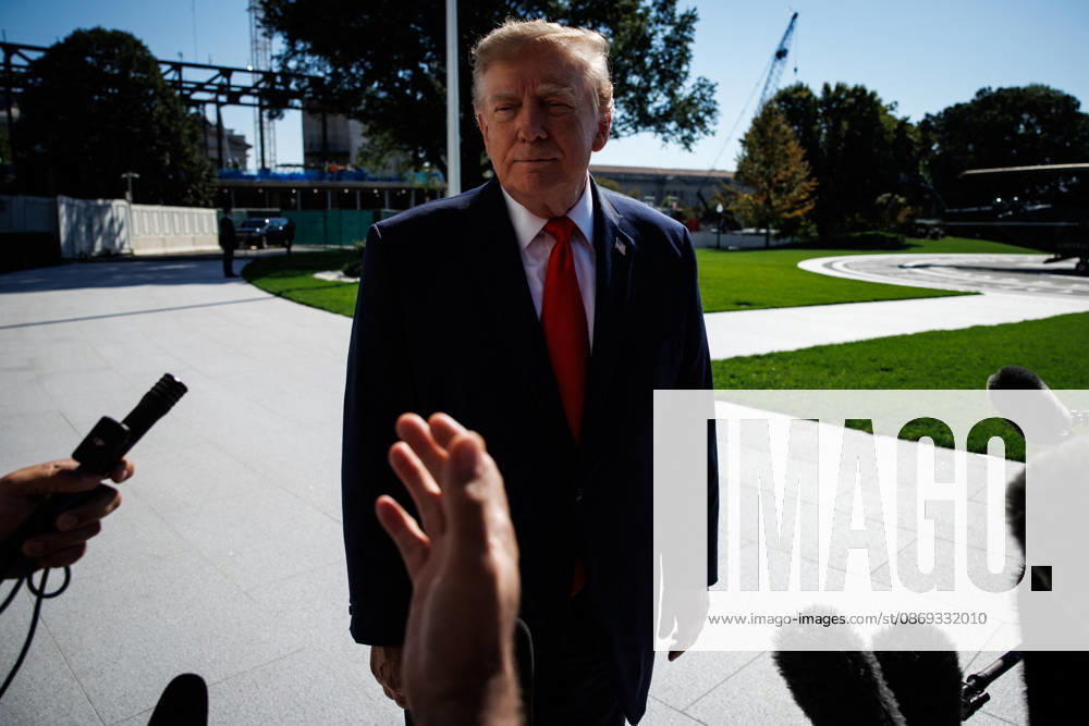 DC: President Trump Departs the White House President Donald Trump speaks to members of the media before departing from the South Lawn of the White House in Marine One on October 13, 2026 in Washington, D.C. Trump is heading to Wasilla, Alaska for a midterm campaign rally in support of Senator Dan Sullivan and Representative Nick Begich before heading to Las Vegas, Nevada where he will spend the night. (Photo by Samuel Corum Pool ABACAPRESS.COM) Washington DC United States