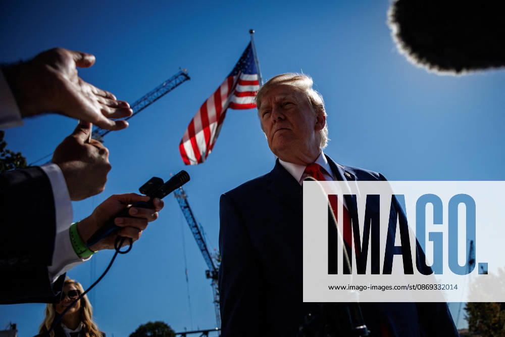 DC: President Trump Departs the White House President Donald Trump speaks to members of the media before departing from the South Lawn of the White House in Marine One on October 13, 2026 in Washington, D.C. Trump is heading to Wasilla, Alaska for a midterm campaign rally in support of Senator Dan Sullivan and Representative Nick Begich before heading to Las Vegas, Nevada where he will spend the night. (Photo by Samuel Corum Pool ABACAPRESS.COM) Washington DC United States