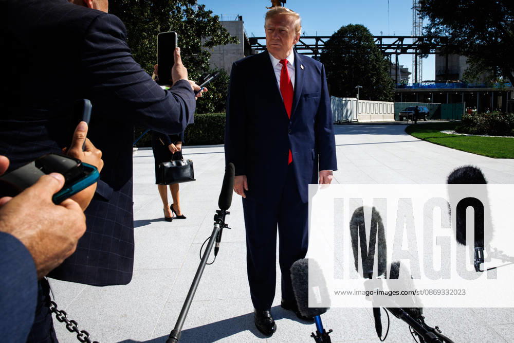 DC: President Trump Departs the White House President Donald Trump speaks to members of the media before departing from the South Lawn of the White House in Marine One on October 13, 2026 in Washington, D.C. Trump is heading to Wasilla, Alaska for a midterm campaign rally in support of Senator Dan Sullivan and Representative Nick Begich before heading to Las Vegas, Nevada where he will spend the night. (Photo by Samuel Corum Pool ABACAPRESS.COM) Washington DC United States