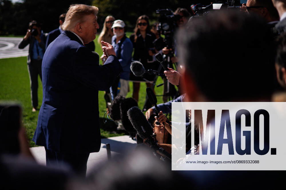 DC: President Trump Departs the White House President Donald Trump speaks to members of the media before departing from the South Lawn of the White House in Marine One on October 13, 2026 in Washington, D.C. Trump is heading to Wasilla, Alaska for a midterm campaign rally in support of Senator Dan Sullivan and Representative Nick Begich before heading to Las Vegas, Nevada where he will spend the night. (Photo by Samuel Corum Pool ABACAPRESS.COM) Washington DC United States