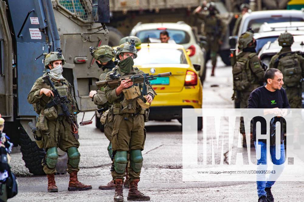 Ramallah, Palestine, State of: RAMALLAH, WEST BANK, PALESTINE, OCTOBER 13, 2026: Israeli forces conduct a raid in Ramallah in the occupied West Bank. The operation includes a raid on the offices of Addameer Prisoner Support and Human Rights Association. The Palestinian Ministry of Health reported two people wounded, including a 14-year-old boy wounded by Israeli gunfire, while several others were treated for tear gas inhalation. Ramallah Palestine, State of - ZUMAq101 20261013_zna_q101_201
