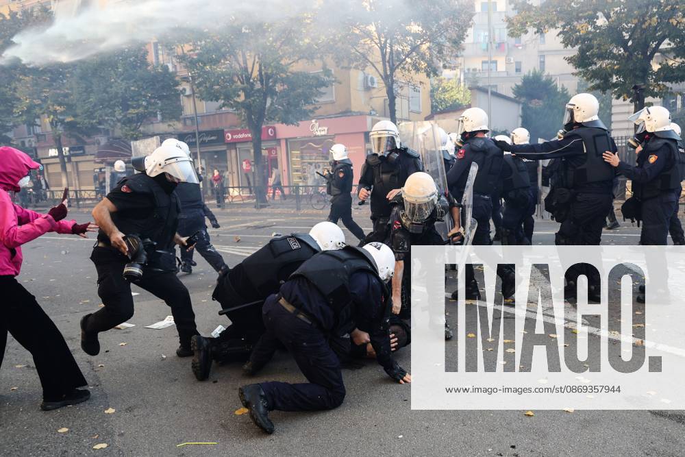 TIRANA, ALBANIA, OCTOBER 13, 2026: Student demonstrators clash with riot police outside the Ministry of Education in Tirana during a protest over university conditions, higher education costs and employment prospects. Police deploy tear gas and water cannons as protesters throw bricks and other objects. Several demonstrators are detained. Tirana Albania - ZUMAq101 20261013_zna_q101_260