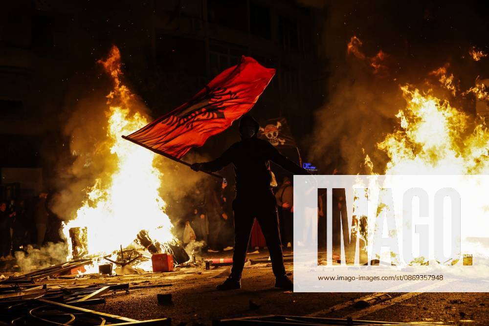 TIRANA, ALBANIA, OCTOBER 13, 2026: Student demonstrators clash with riot police outside the Ministry of Education in Tirana during a protest over university conditions, higher education costs and employment prospects. Police deploy tear gas and water cannons as protesters throw bricks and other objects. Several demonstrators are detained. Tirana Albania - ZUMAq101 20261013_zna_q101_262