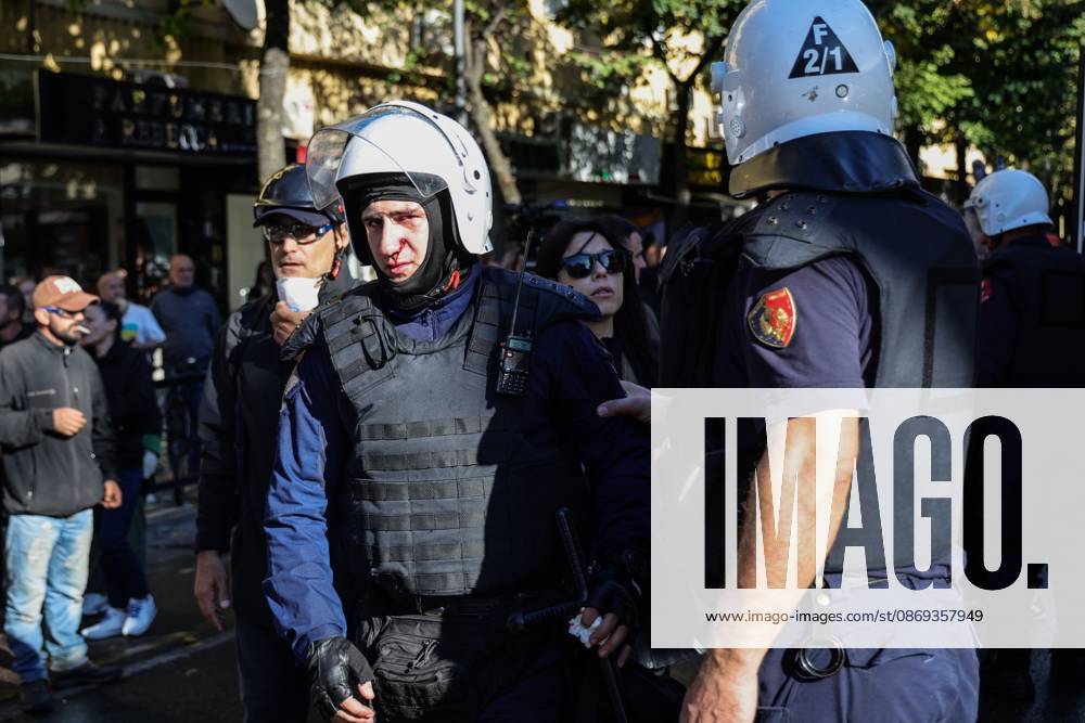 TIRANA, ALBANIA, OCTOBER 13, 2026: Student demonstrators clash with riot police outside the Ministry of Education in Tirana during a protest over university conditions, higher education costs and employment prospects. Police deploy tear gas and water cannons as protesters throw bricks and other objects. Several demonstrators are detained. Tirana Albania - ZUMAq101 20261013_zna_q101_263