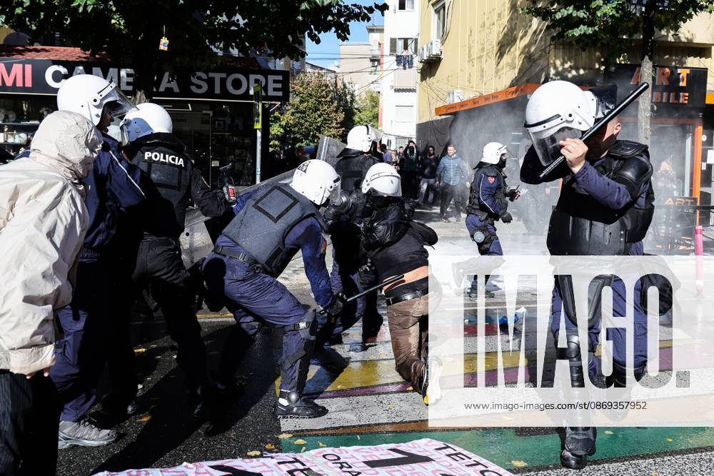 TIRANA, ALBANIA, OCTOBER 13, 2026: Student demonstrators clash with riot police outside the Ministry of Education in Tirana during a protest over university conditions, higher education costs and employment prospects. Police deploy tear gas and water cannons as protesters throw bricks and other objects. Several demonstrators are detained. Tirana Albania - ZUMAq101 20261013_zna_q101_266