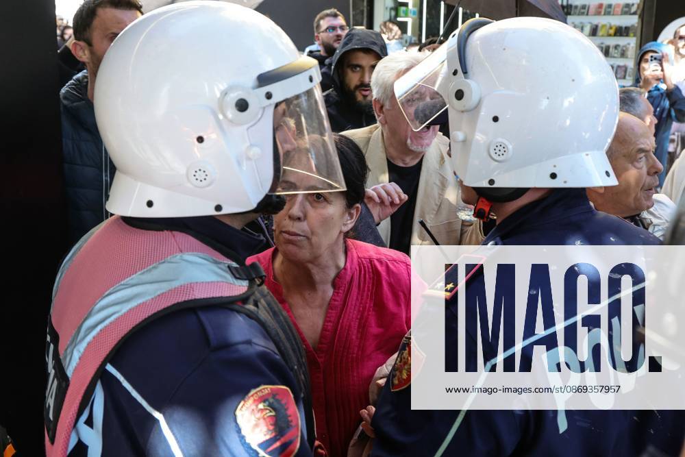 TIRANA, ALBANIA, OCTOBER 13, 2026: Student demonstrators clash with riot police outside the Ministry of Education in Tirana during a protest over university conditions, higher education costs and employment prospects. Police deploy tear gas and water cannons as protesters throw bricks and other objects. Several demonstrators are detained. Tirana Albania - ZUMAq101 20261013_zna_q101_269