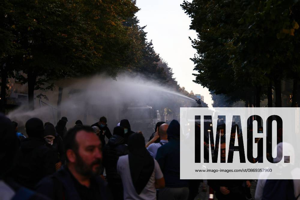 TIRANA, ALBANIA, OCTOBER 13, 2026: Student demonstrators clash with riot police outside the Ministry of Education in Tirana during a protest over university conditions, higher education costs and employment prospects. Police deploy tear gas and water cannons as protesters throw bricks and other objects. Several demonstrators are detained. Tirana Albania - ZUMAq101 20261013_zna_q101_270