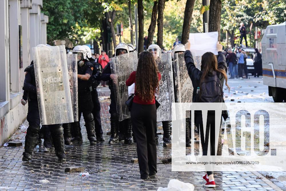 TIRANA, ALBANIA, OCTOBER 13, 2026: Student demonstrators clash with riot police outside the Ministry of Education in Tirana during a protest over university conditions, higher education costs and employment prospects. Police deploy tear gas and water cannons as protesters throw bricks and other objects. Several demonstrators are detained. Tirana Albania - ZUMAq101 20261013_zna_q101_275