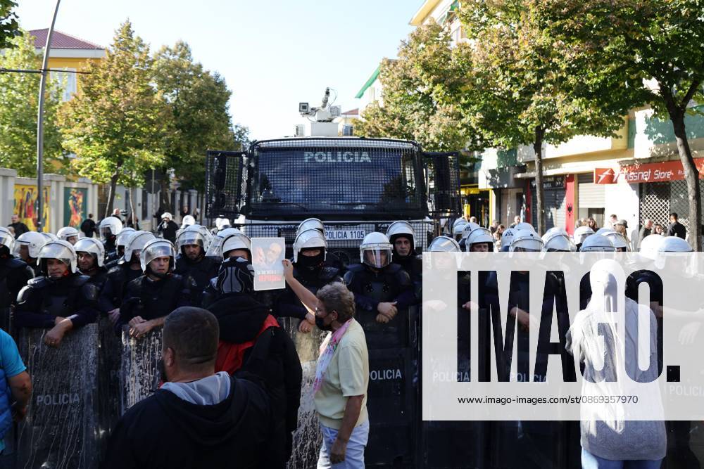 TIRANA, ALBANIA, OCTOBER 13, 2026: Student demonstrators clash with riot police outside the Ministry of Education in Tirana during a protest over university conditions, higher education costs and employment prospects. Police deploy tear gas and water cannons as protesters throw bricks and other objects. Several demonstrators are detained. Tirana Albania - ZUMAq101 20261013_zna_q101_276