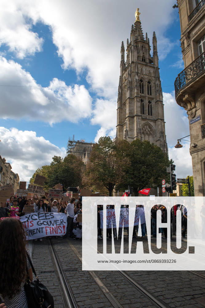 High School Stdent Mobilisation - Bordeaux High school students march behind banners along the tram tracks, with the Pey-Berland Tower in the background, during Act V of the high school student mobilisation in Bordeaux, France on October 13, 2026, protesting against education reforms. Photo by Fabrice Sapte ABACAPRESS.COM Bordeaux France